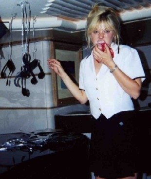 Julie Perry in her days as a yacht stew, decorating for a Broadway-themed party for charter guests. Note: The yacht she was on is the identical twin to M/Y "Honor" used on Bravo's "Below Deck", so imagine that yacht, but with a grand piano in the main salon (that was a nightmare to clean!).