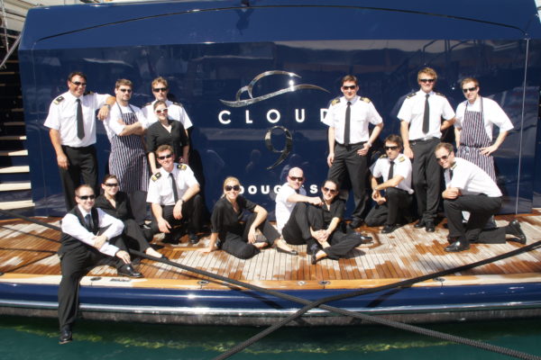 Motoryacht Cloud 9 Superyacht Crew on Aft Deck