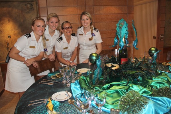 The megayacht stewardesses of M/Y "Huntress" strut their table-decorating stuff! Photo Credit: Suki Finnerty of YachtingToday.TV